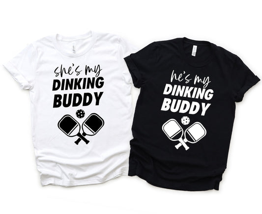 Funny "He's My Dinking Buddy" and "She's My Dinking Buddy" matching pickleball couple T-shirts for game day and gifts.