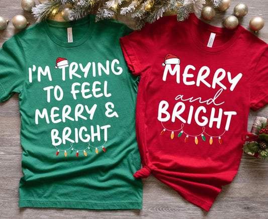 Funny "Merry and Bright" matching couple Christmas shirts for holiday parties and adult humor gifts.